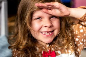 Girl with missing teeth